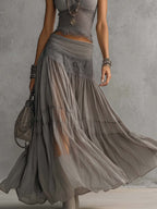 Conjunto Elena com top de painéis de renda e saia maxi plissada