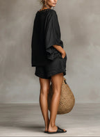 Conjunto Lila de blusa de renda com decote barco e calções