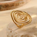 Anillo llamativo dorado, escultórico y en espiral, Vortex