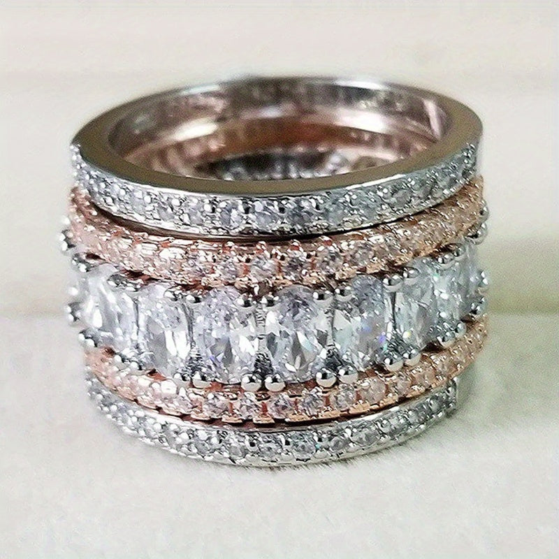 Anel elegante de banda larga, brilhante e bicolor, com zircónias