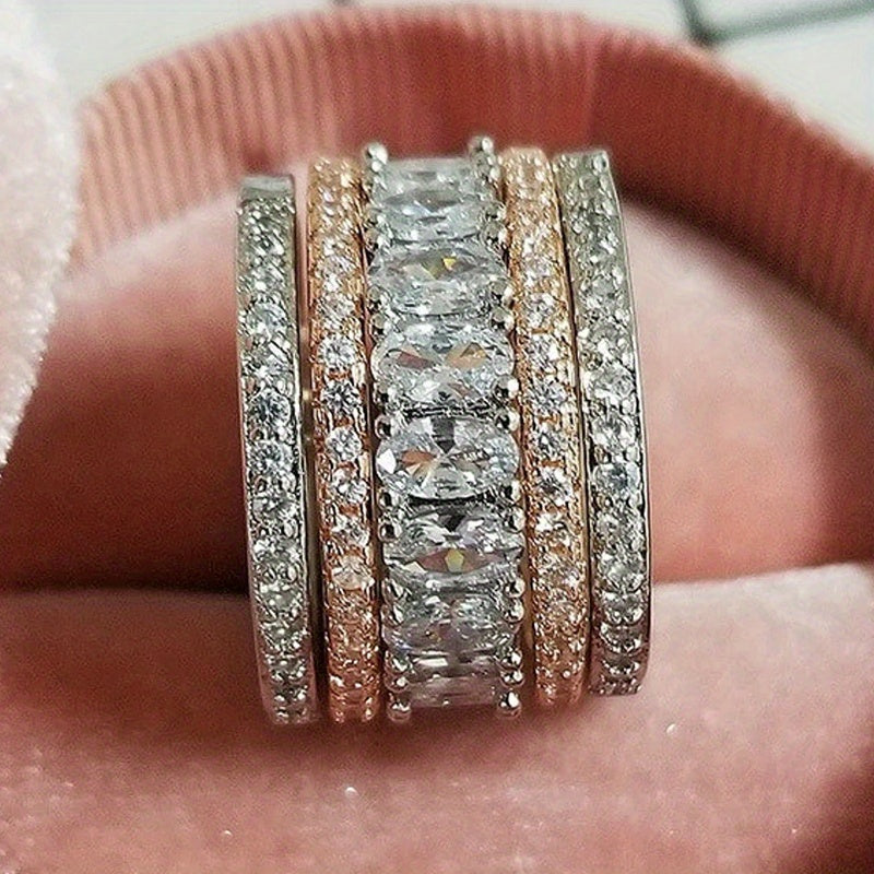 Anel elegante de banda larga, brilhante e bicolor, com zircónias