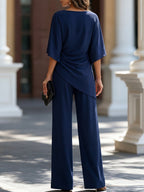 Genevieve cape-sleeve draped waist two-piece pants set by Bennett and Lowe, featuring a stylish, modern design with flowing fabric.