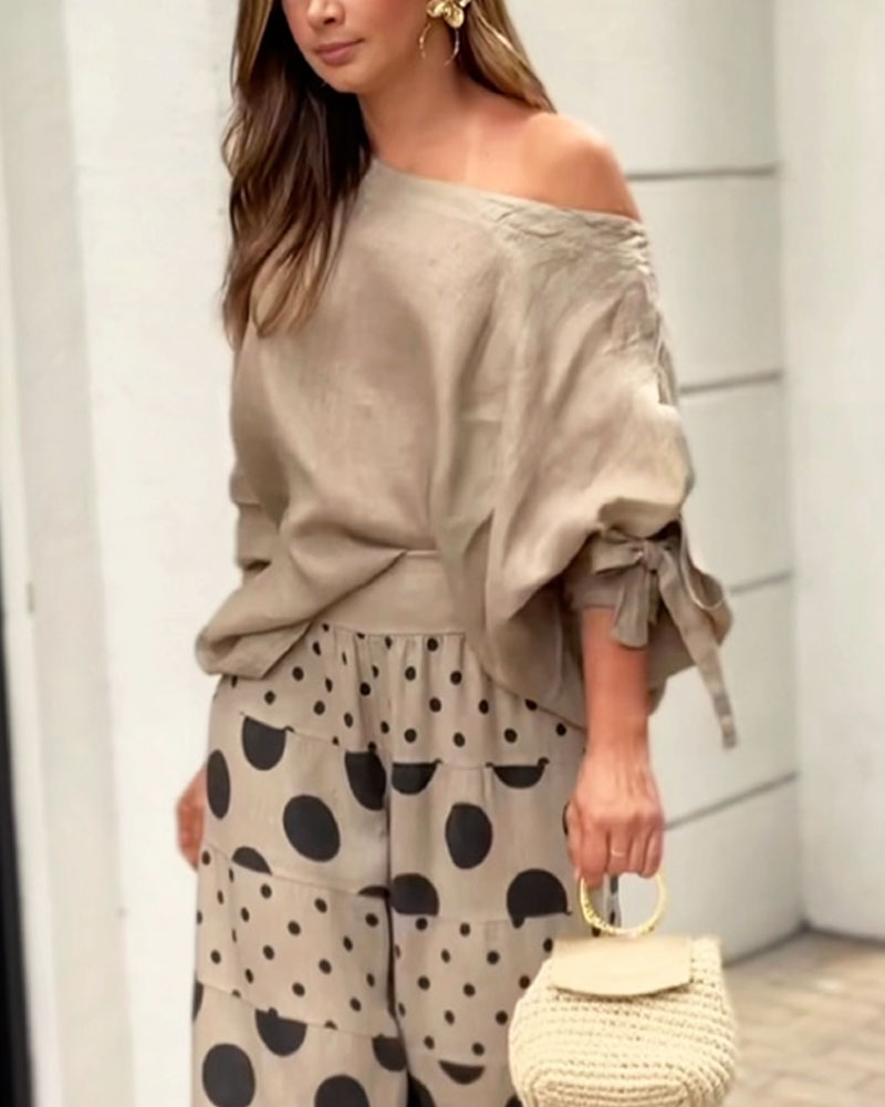 Conjunto informal de top de hombros descubiertos y pantalones estampados Samantha