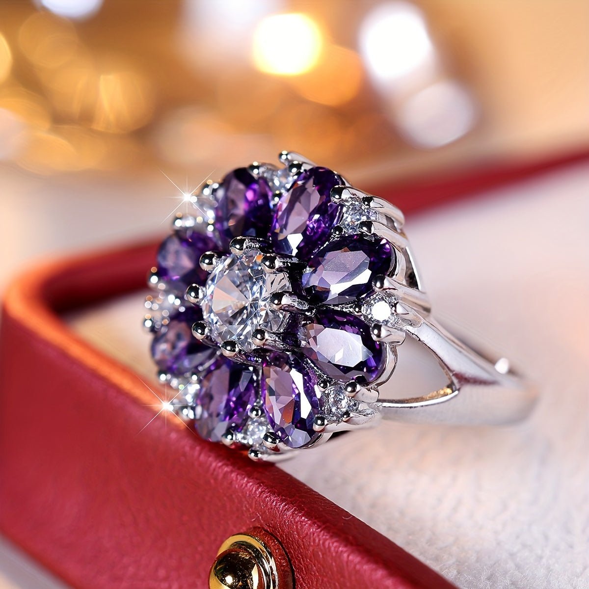 Anel elegante e vistoso com flor de zircónias roxas