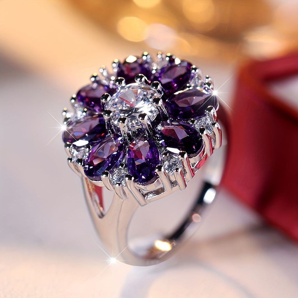 Anel elegante e vistoso com flor de zircónias roxas