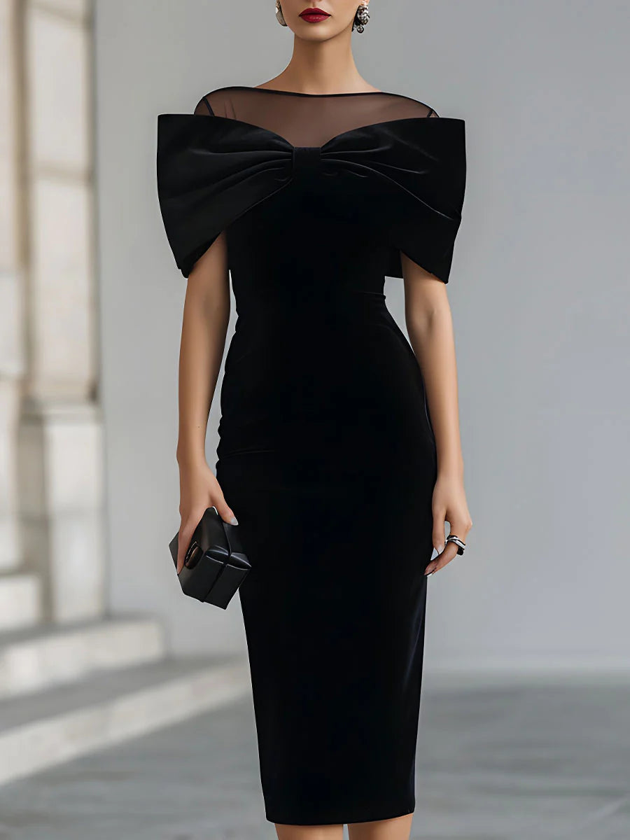 Vestido midi dramático de veludo preto com laço