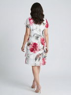 Keoni | Vestido em camadas na altura do joelho com estampa floral delicada