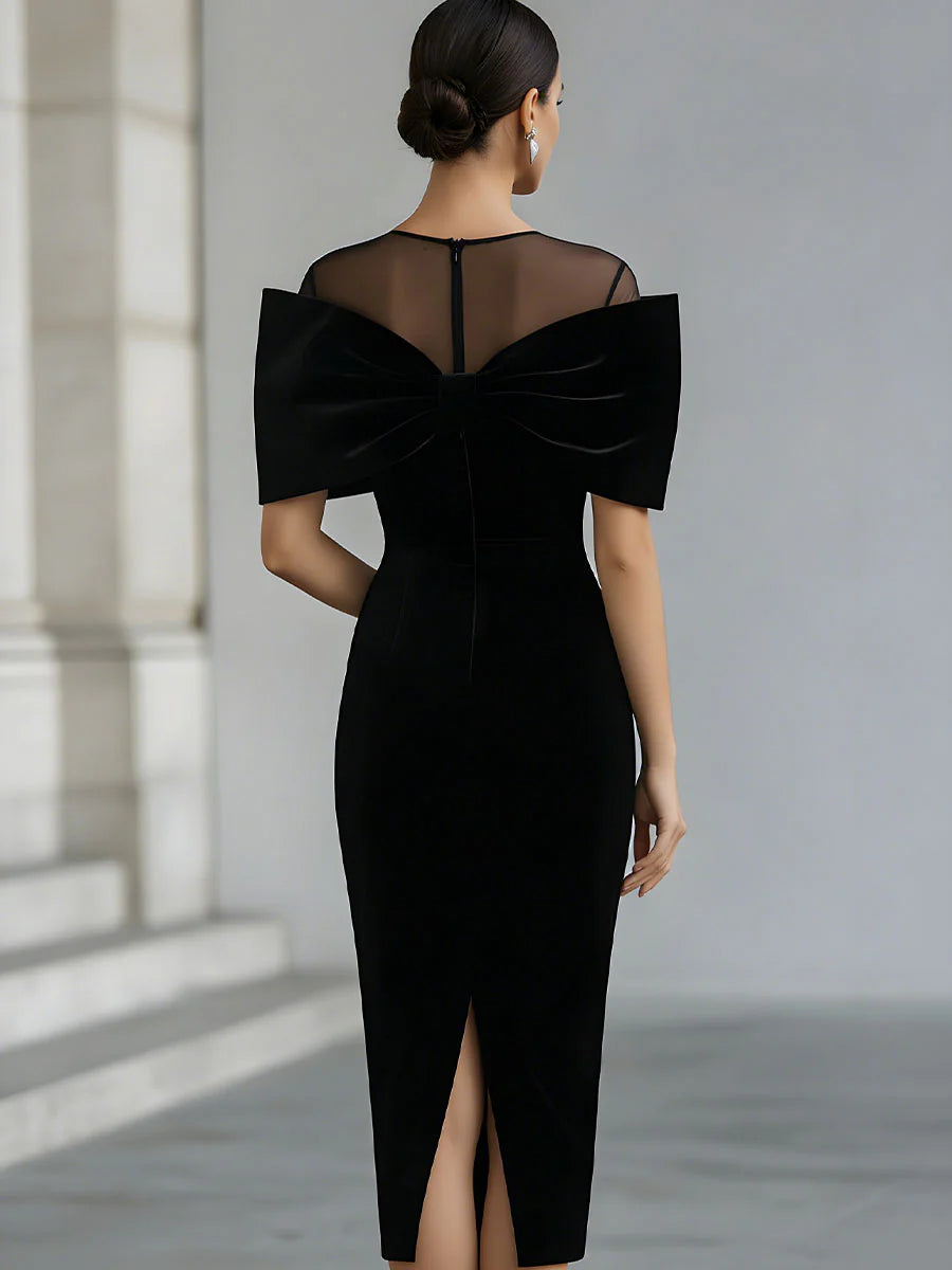 Vestido midi dramático de veludo preto com laço