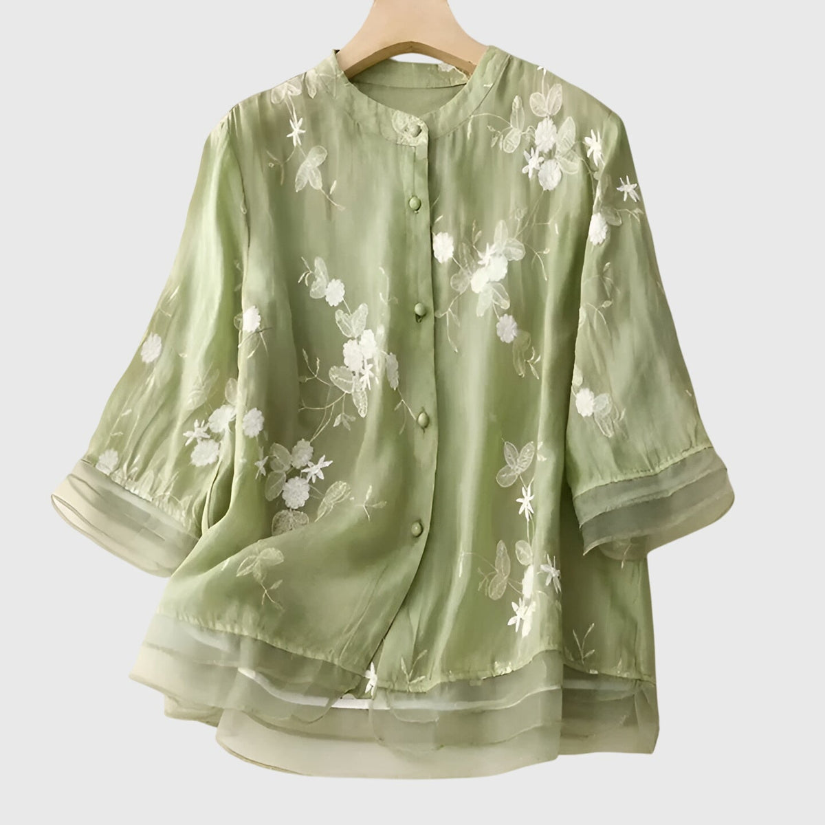 Nellie | Top elegante com flores bordadas