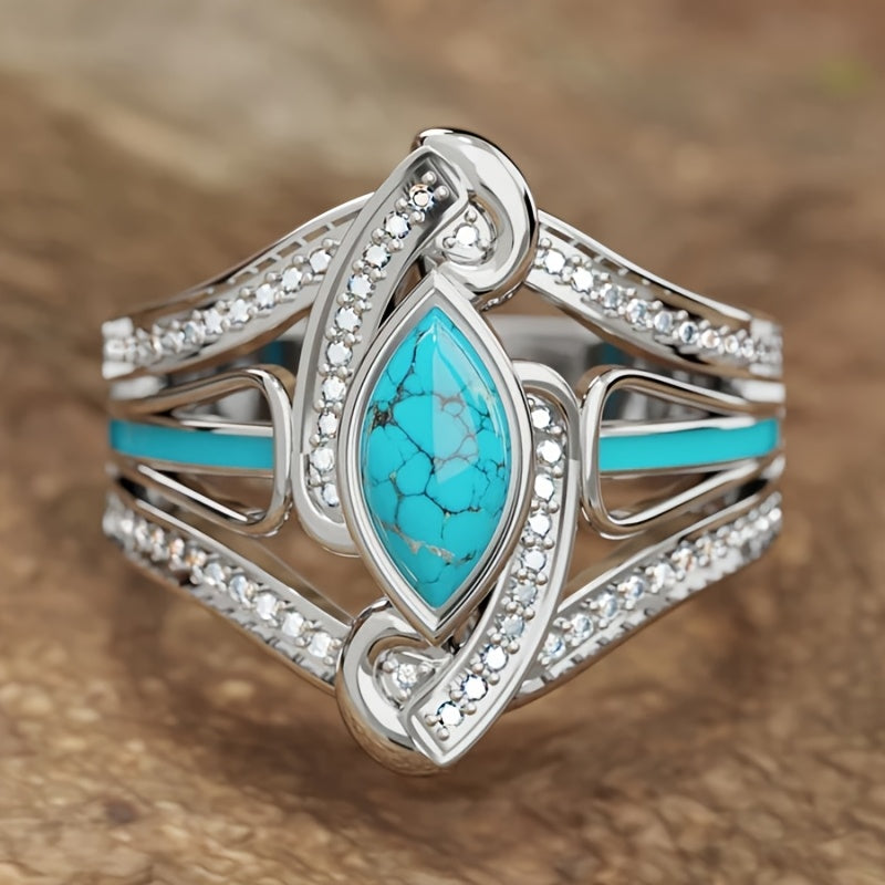 Elegante anillo bohemio de turquesa con baño de oro blanco