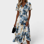 Elara | Vestido midi floral cruzado en la cintura
