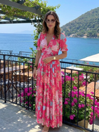 Ione | Vestido midi floral com mangas curtas e decote em V