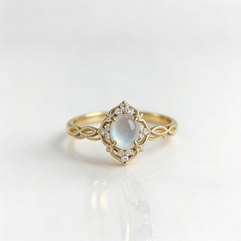 Elegante anillo de piedra lunar ojo de gato con flor hueca