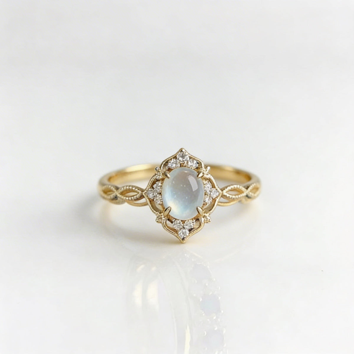 Elegante anillo de piedra lunar ojo de gato con flor hueca