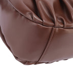 Chara | Croissant-shaped leather sling bag