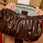 Chara | Croissant-shaped leather sling bag