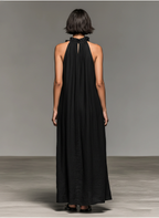 Gladys maxi dress with pockets by Bennett and Lowe, featuring a flowy silhouette and stylish design, shown in the image.