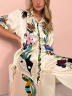 Conjunto de camisa de cetim estampada e calças Luca