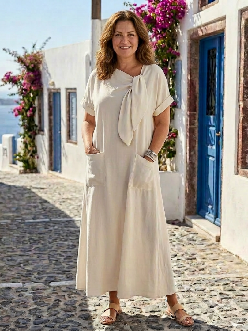 Elowyn | Vestido maxi com bolsos, gola redonda e manga curta