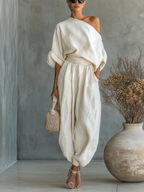 Conjunto de top de hombros descubiertos y pantalones ajustados Sophie