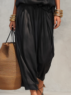 Serena Conjunto de top con cuello halter y pantalones plisados