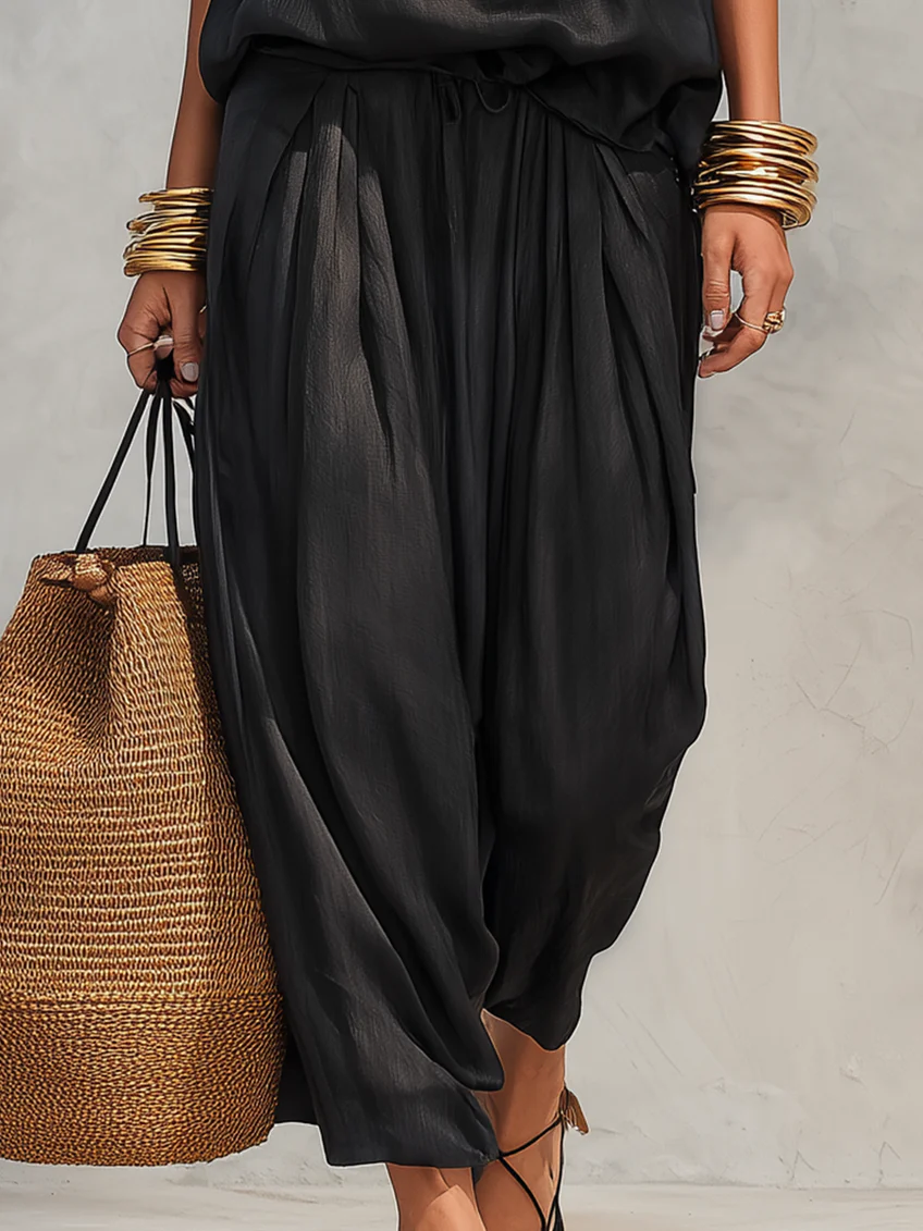 Serena Conjunto de top con cuello halter y pantalones plisados