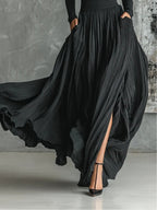 Conjunto Samantha todo preto de camisola de gola alta e saia plissada