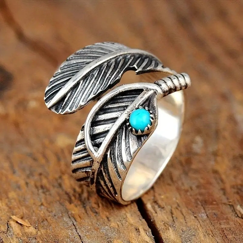 Anillo bohemio de plumas y turquesa en plata de ley