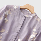 Nellie | Top elegante com flores bordadas