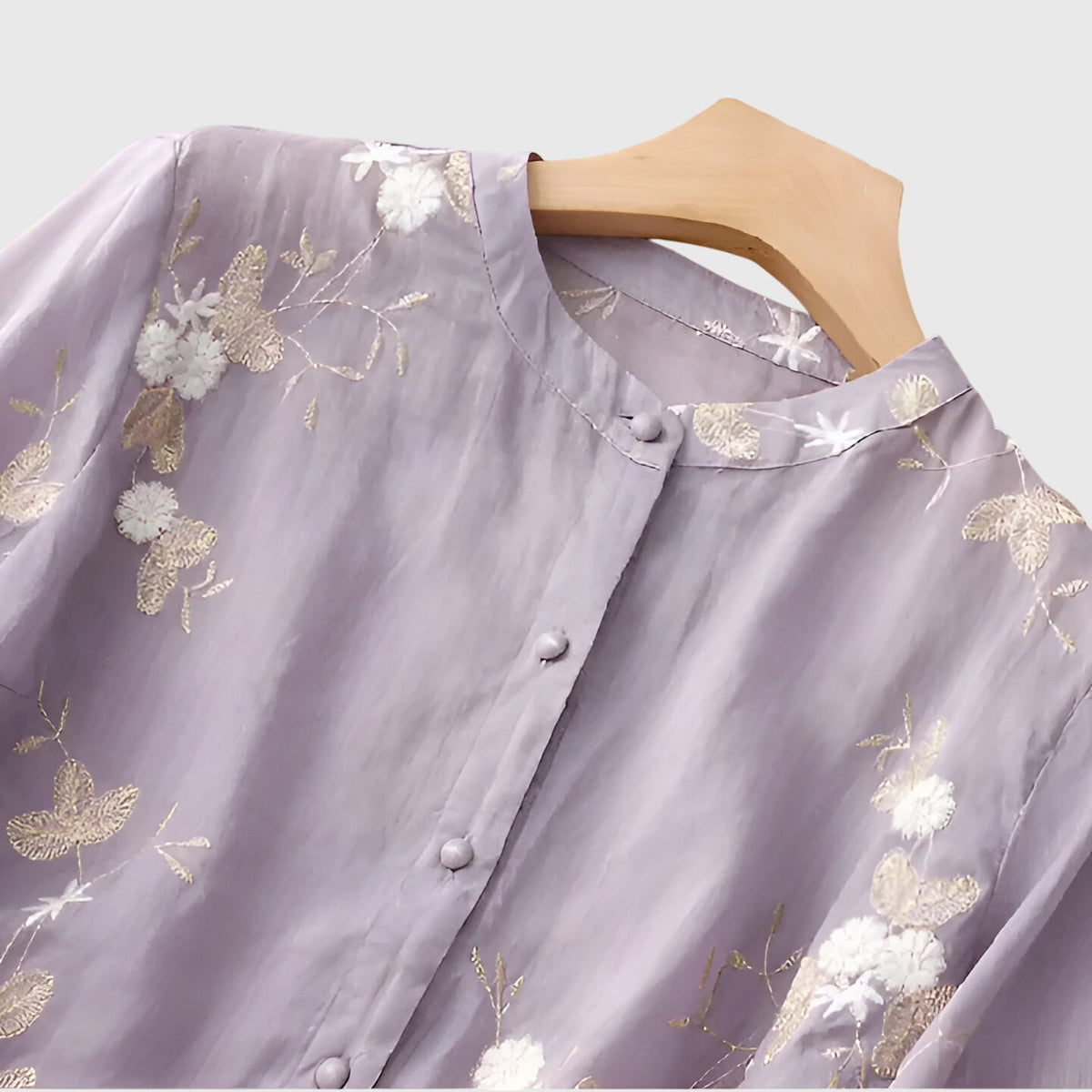 Nellie | Top elegante com flores bordadas