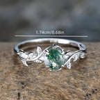Anillo vintage de plata con hoja de ágata musgosa y hierba acuática redonda
