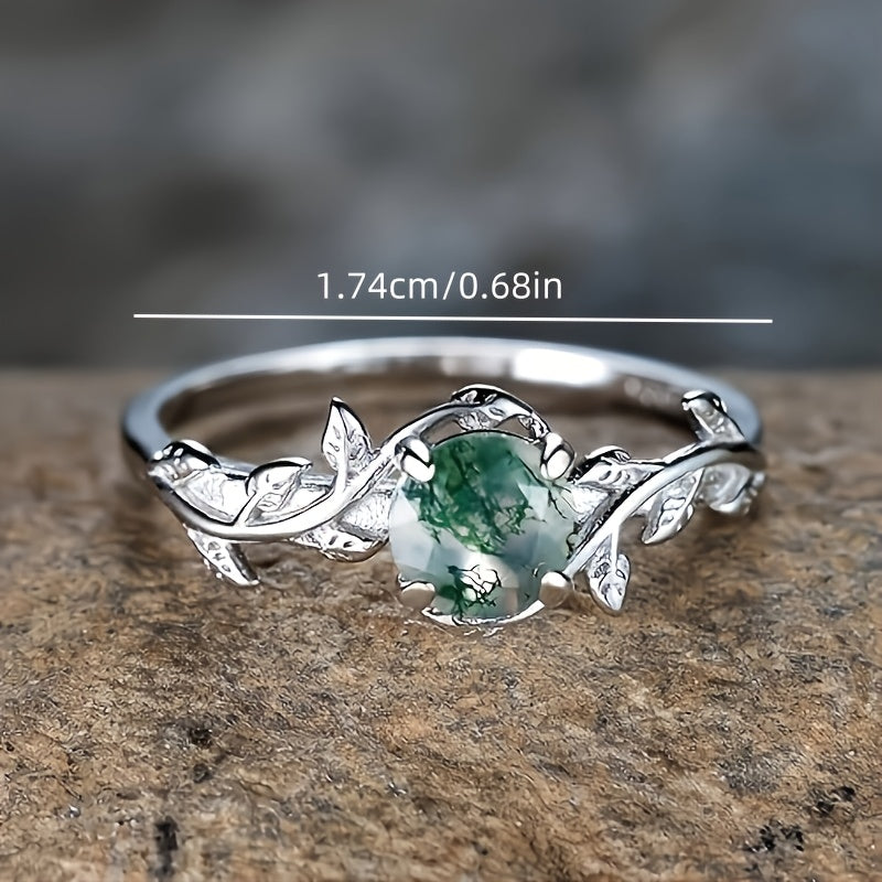 Anillo vintage de plata con hoja de ágata musgosa y hierba acuática redonda