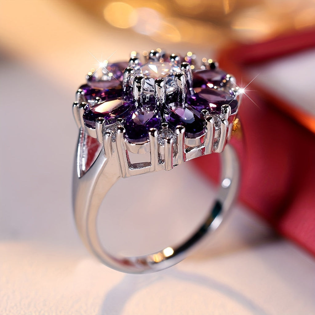 Anel elegante e vistoso com flor de zircónias roxas