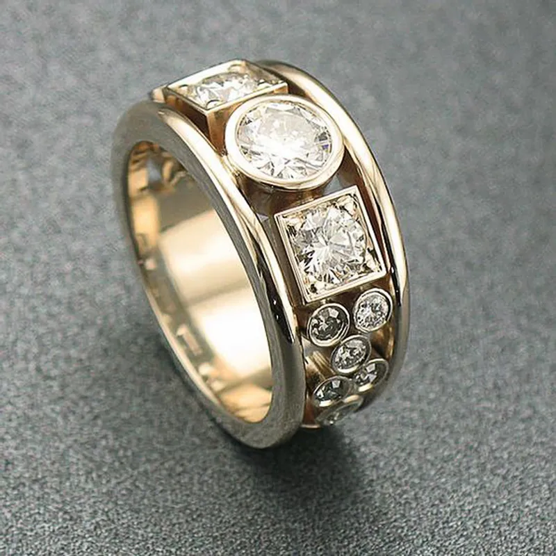 Elegante anillo vintage de oro con múltiples circonitas