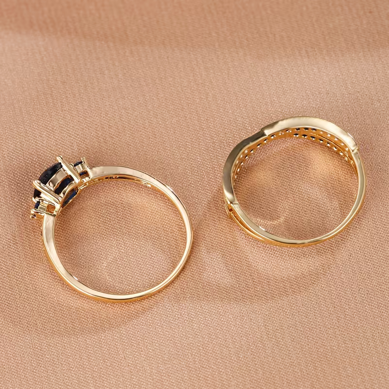 Juego de anillos dobles de esmeralda