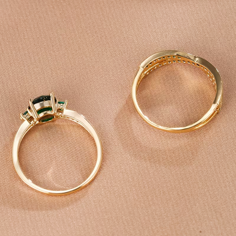 Juego de anillos dobles de esmeralda
