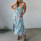 Vestido comprido floral com corpete franzido e alças ajustáveis